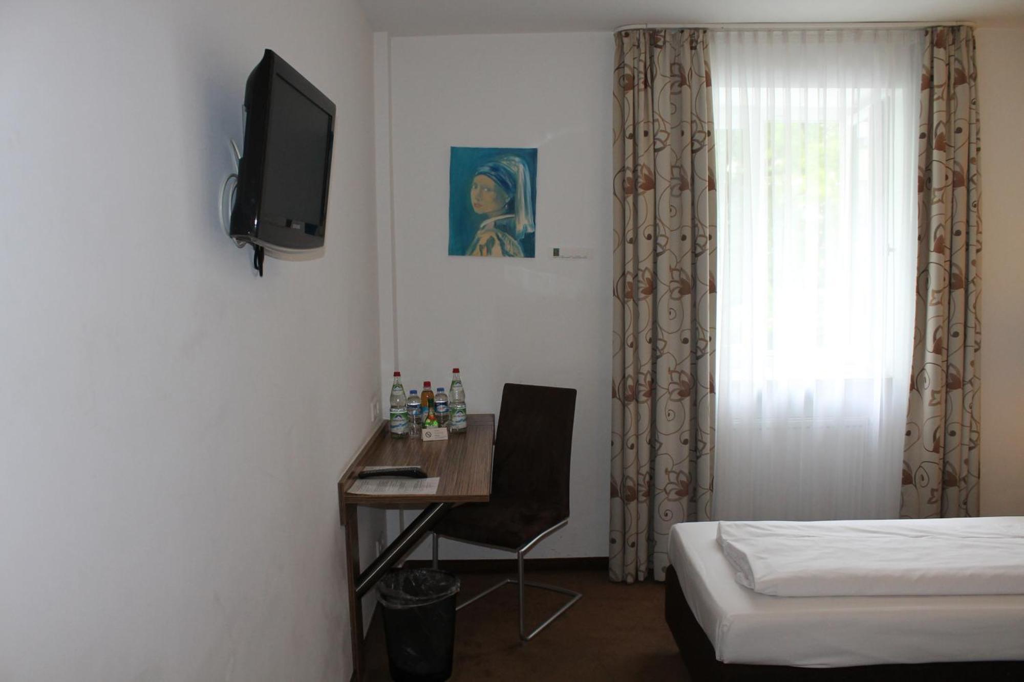 Hotel Andra Muenchen Munique Quarto foto